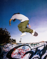 a man doing a trick on a skateboard