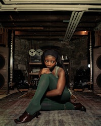 a woman sitting on the floor