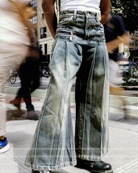 a person wearing a pair of wide leg pants
